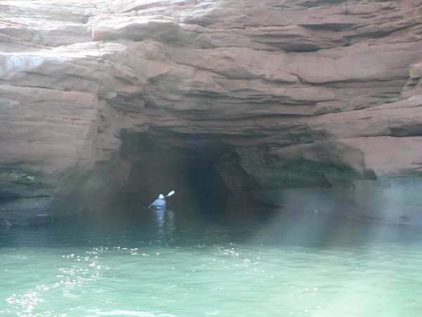 Kayak in front of grotto