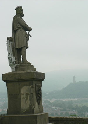 King overlooking his castle